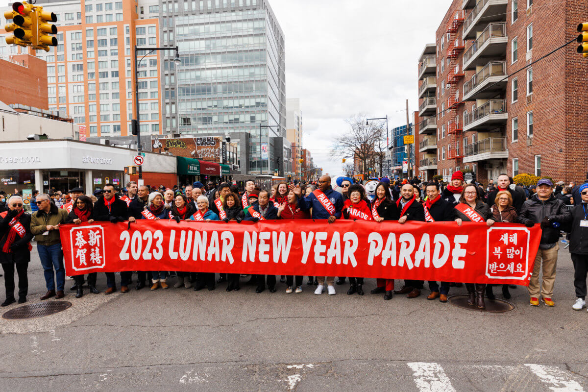 people with a lunar year banner